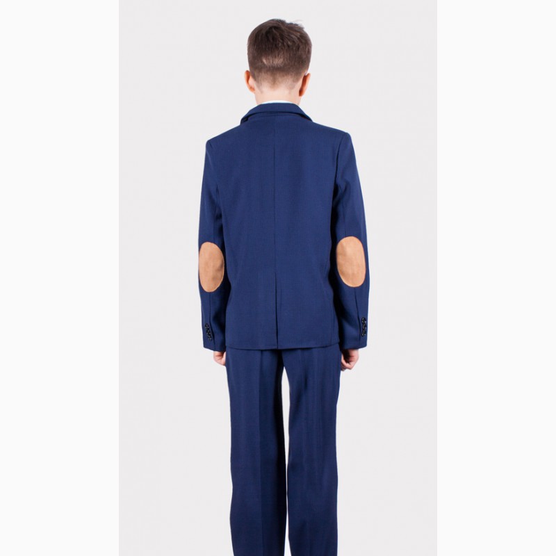 Фото 4. Школьный костюм для мальчика синего цвета с заплатками